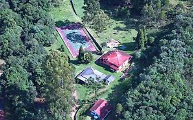 Sitio Tertulia Chalés e Cachoeira